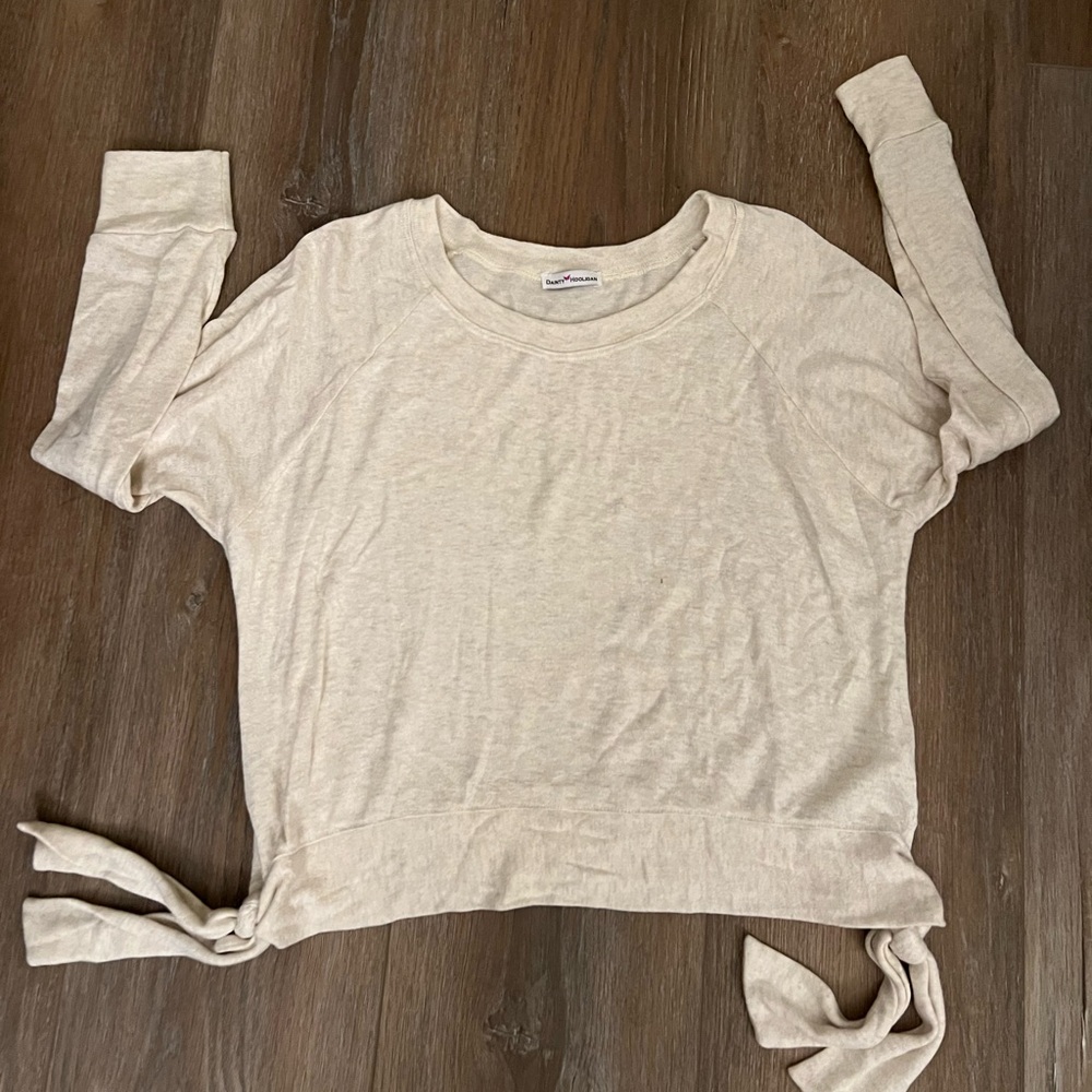 Dainty Hooligan: long sleeve, loose fitting top in ivory/cream color